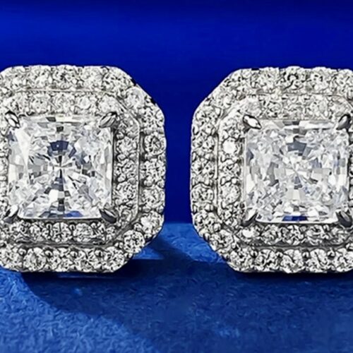 LC Princess Cut White Sapphires Surrounded By Round LC Sapphires Set In Sterling Silver.